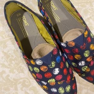 Toms polka dot sneakers, worn once or twice. Comes in original box and dust bag.